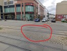 Foto: Regenrinnen Fahrbahn defekt Einmündung Deutsches Dorf 